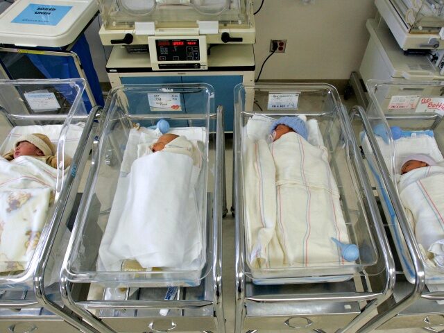 Newborns wait in the nursery at Santa Monica UCLA Medical Center on Tuesday 1/10/2006. Many women a Chun, Myung J. –– – 106339.HE.0110.cesare.MJC –– Newborns wait in the nursery at