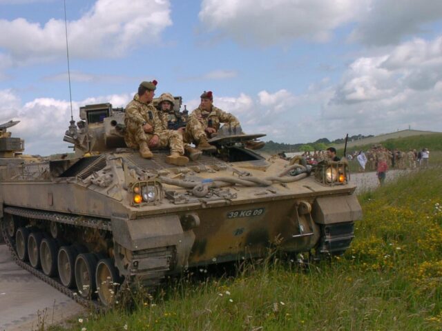 Armoured vehicles and soldiers of the 1st Battalion The Black Watch (Royal Highland Regime