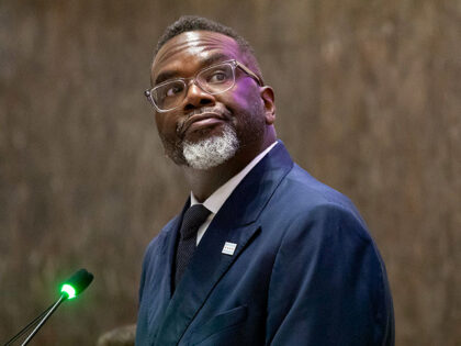 Chicago Mayor Brandon Johnson watches as votes are cast, July 15, 2026, during a City Coun