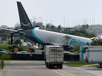 GettyImages2293852643 An Amazon cargo plane is seen after it crashed at Miami International Airport on September