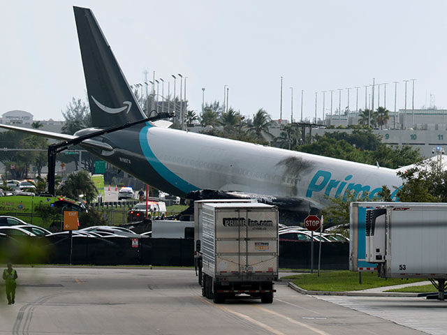 An Amazon cargo plane is seen after it crashed at Miami International Airport on September