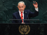 Israel's Prime Minister Benjamin Netanyahu holds up a pager as he speaks during the 81st United Nations General Assembly at the United Nations Headquarters in New York, on September 24, 2026. (Photo by TIMOTHY A. CLARY / AFP via Getty Images)