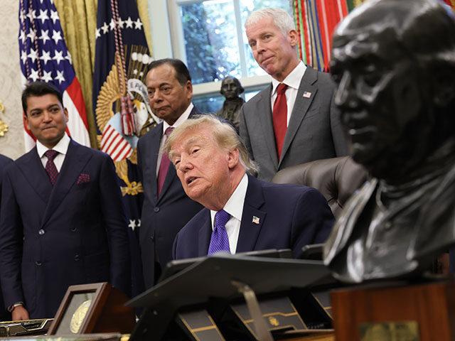 GettyImages2297596934 U.S. President Donald Trump answers questions from reporters while making an announcement