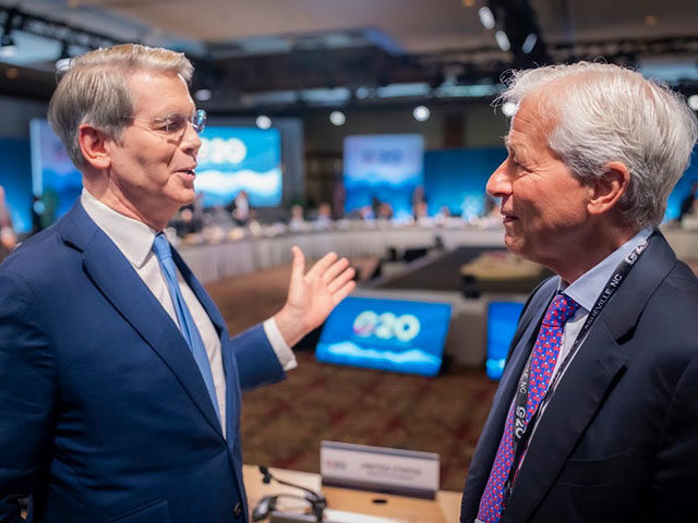 U.S. Treasury Secretary Scott Bessent (left) and JP Morgan Chase CEO Jamie Dimon speak at