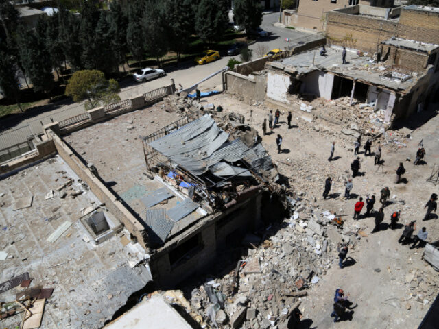 An aerial view of damaged residential buildings in the Vahdat neighborhood following recen