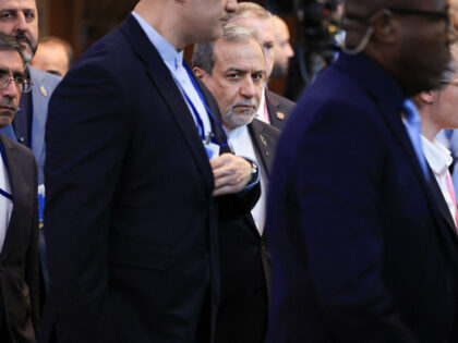 TOPSHOT - Iran's Foreign Minister Abbas Araghchi (C) arrives for the 81st United Nations G