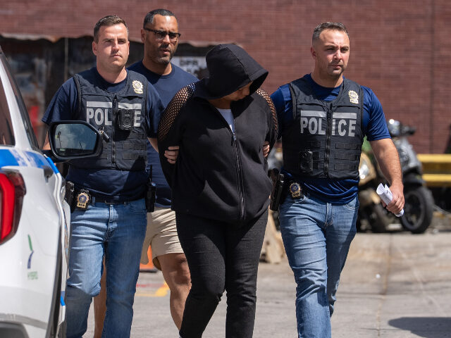 Jennifer Lackard Jennifer Lackard is pictured in police custody outside the NYPD 44th Precinct station hous