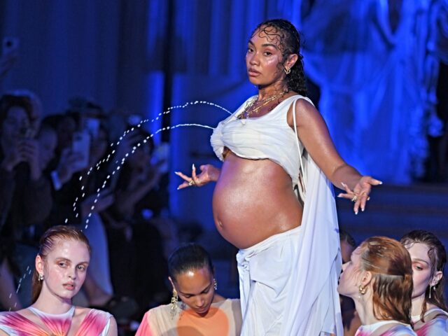 LONDON, ENGLAND - SEPTEMBER 21: Leigh-Anne Pinnock walks the runway at the Di Petsa show d