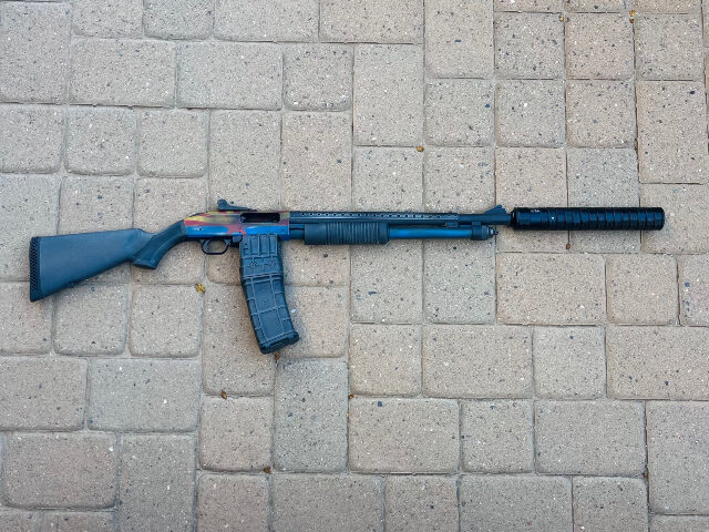 Mossberg 590M w_ SGX 12GA Suppressor