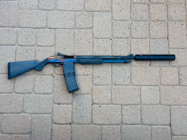 Mossberg-590M-w_-SGX-12GA-Suppressor.jpg
