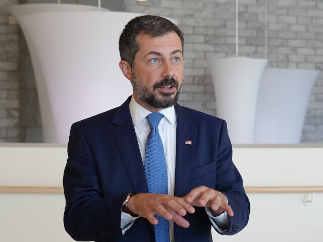 Former Transportation Secretary Pete Buttigieg speaks to reporters after speaking at the S