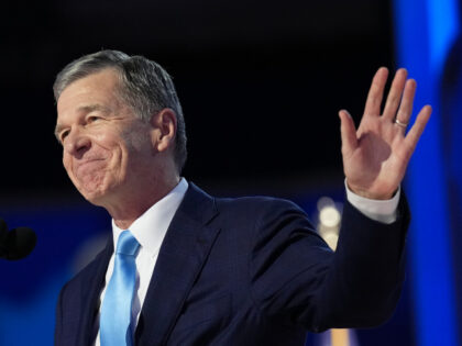 North Carolina Gov. Roy Cooper speaks onstage during the final day of the Democratic Natio