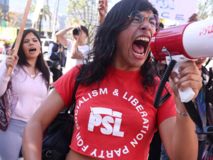 Cecilia M. With the group, Party for Socialism and Liberation, joins protesters who descen