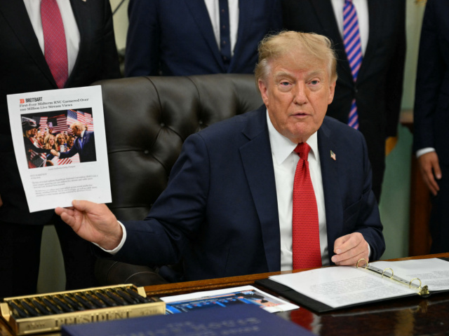 Trump-Holds-Up-Breitbart-Article.jpeg