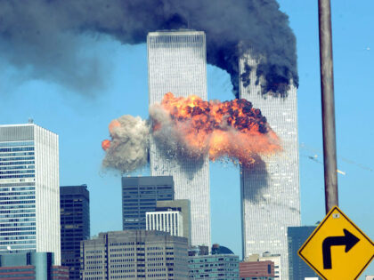 A fiery blasts rocks the World Trade Center after being hit by two planes September 11, 20