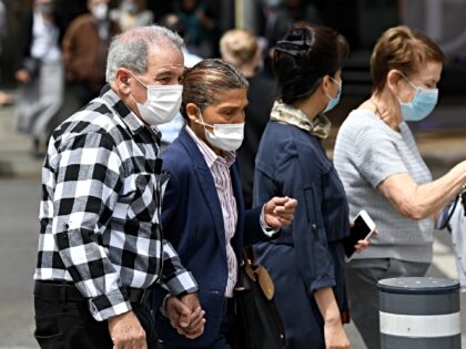 BRISBANE, AUSTRALIA - SEPTEMBER 28: People are seen wearing masks in the Brisbane CBD on S