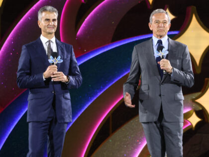 SHANGHAI, CHINA - JUNE 15: Former CEO of Walt Disney Company Bob Iger and current CEO of W