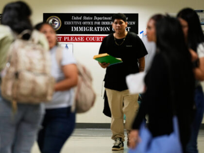 People arrive for immigration court hearings in New York, Monday, July 27, 2026. Seth Weni