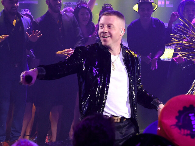 macklemoreAlMayadeen 2 Macklemore performs onstage during Dick Clark's New Year's Rockin' Eve With Ryan Seacrest
