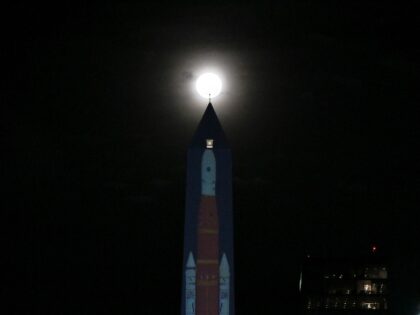 TOPSHOT - A projection depicting the lift-off of the Artemis II crewed lunar mission is di