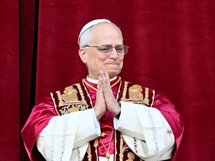 Newly elected Pope Leo XIV, Robert Prevost arrives on the main central loggia balcony of t