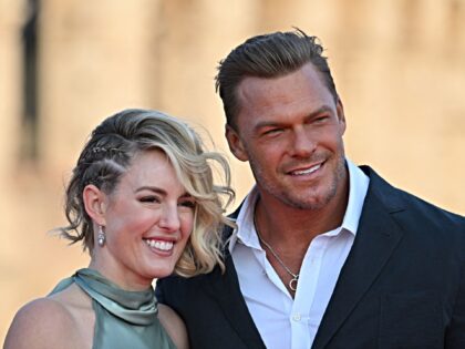 US actor and singer Alan Ritchson and his wife Catherine Ritchson arrive for the Premiere