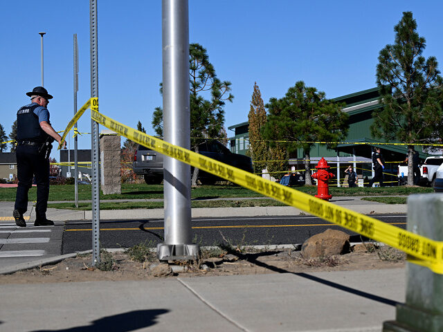 10-15-26-Silver-Rail-Elementary-school-shooting-Oregon-ap Police tape is placed outside Silver Rail Elementary school, where a shooting took place,