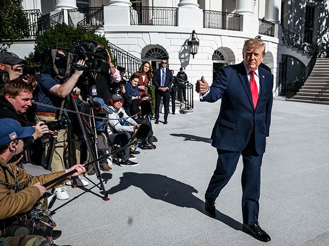 President Donald J. Trump speaks to members of the media before boarding Marine One on the South Lawn of the White House, en route to Michigan for a midterm rally, Sunday, October 25, 2026. (Official White House Photo by Patrick Witty)