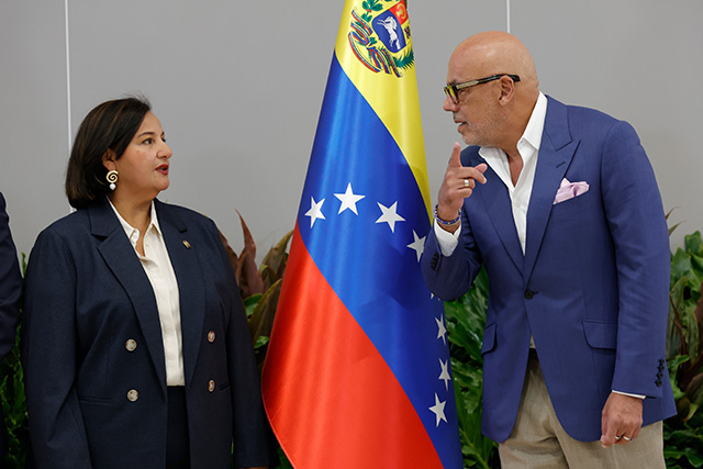 Title: Venezuela Politics Image ID: 26218734587490 Article: Former opposition National Assembly President Dinorah Figuera, left, and National Assembly President Jorge Rodriguez gather for a photo op during the launch of a new round of political talks in Caracas, Venezuela, Thursday, Aug. 6, 2026. (AP Photo/Pedro Mattey)