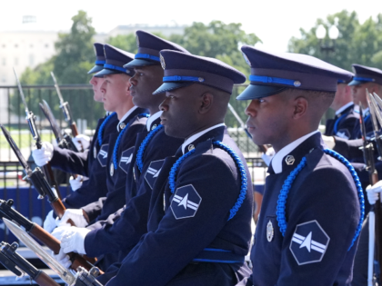 Members of U.S. Space force perform on the track before the IndyCar Freedom 250 Grand Prix