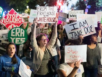Title: Cornell Investigation Image ID: 26282063926679 Article: Demonstrators march to the