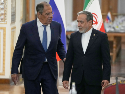 Iranian Foreign Minister Abbas Araghchi, right, and Russian Foreign Minister Sergey Lavrov