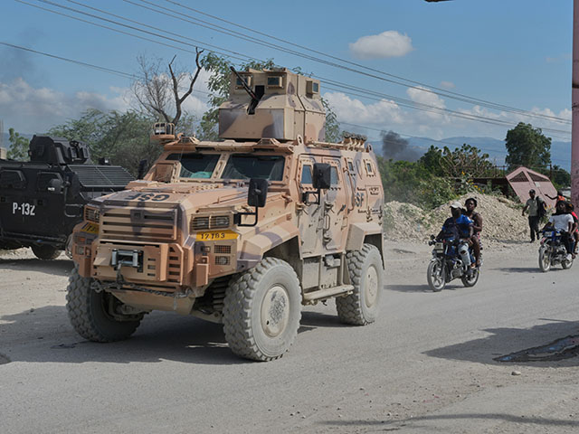 Title: Haiti Security Image ID: 26292630777492 Article: Armored police vehicles that are part of the Gang Suppression Force (GSF) patrol the Tabarre neighborhood of Port-au-Prince, Haiti, Monday, Oct. 19, 2026. (AP Photo/Odelyn Joseph)