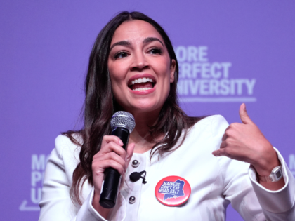Rep. Alexandria Ocasio-Cortez, D-N.Y., respond to audience question during a "Student
