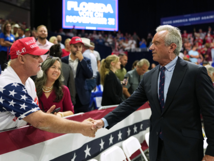 Health and Human Services Secretary Robert F. Kennedy Jr. greets people before President D