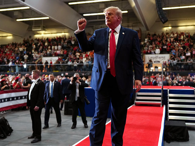 Title: Trump Image ID: 26298802485482 Article: President Donald Trump departs after speaking during a campaign rally at McMorran Place Sports and Entertainment Center, Sunday, Oct. 25, 2026, in Port Huron, Mich. (AP Photo/Julia Demaree Nikhinson)
