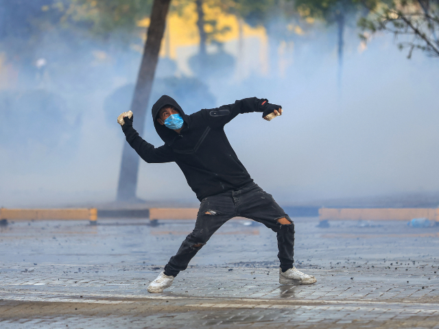 Albania unrest: rioters torch government buildings in corruption protests