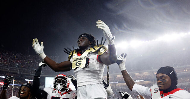 WATCH: Angry Bama Fans Shower Georgia Players with Cans and Drinks After Controversial Loss