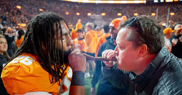 Tennessee Smokes Cigars After Shocking Bama but Fuels Rivals NIL Fund After $500K Fine for Storming the Field