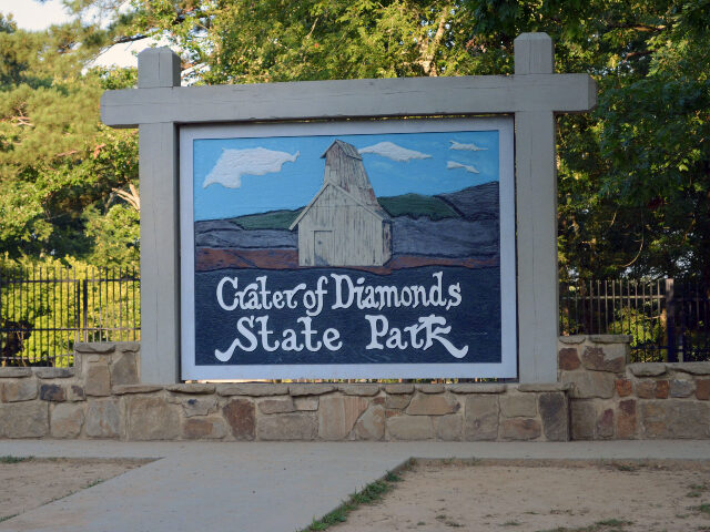 Crater of Diamonds State Park entrance sign iStock / Getty Images Plus