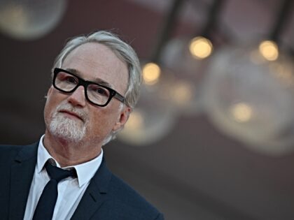 US director David Fincher poses during the red carpet of the movie "The Killer" presented