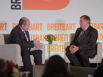 Dr. Michael Burgess, Former Congressman (R-TX) Adviser, RX Border Defense (r) talks to Bre