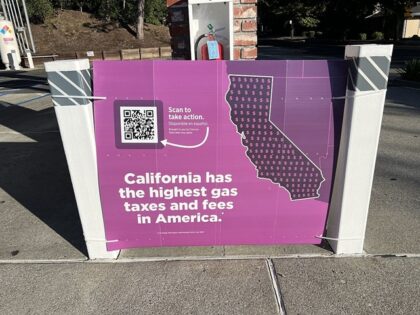 Sign explaining California gas taxes at a Chevron station in Lafayette, California, Octobe