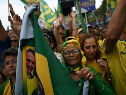 Supporters of Brazil's right-wing presidential candidate and senator Flavio Bolsonaro atte