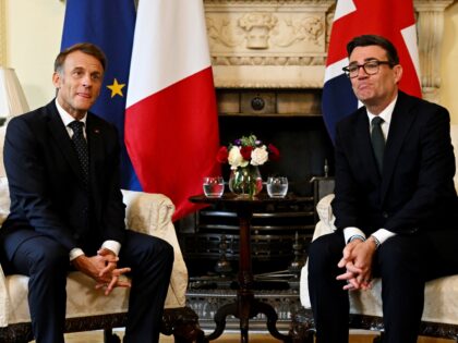 LONDON, ENGLAND - SEPTEMBER 03: British Prime Minister Andy Burnham (R) speaks with French