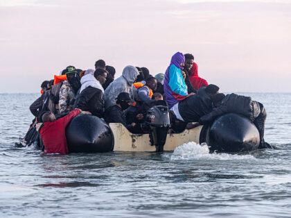 GRAVELINES, FRANCE - SEPTEMBER 06: An inflatable dinghy carrying migrants in the sea. Migr