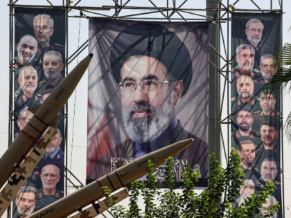 Iranian-made Zolfaghar missiles are seen on display beside a large portrait of Iran's supr