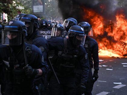 PARIS, FRANCE - OCTOBER 6: Clashes occur between demonstrators and riot police during a pr