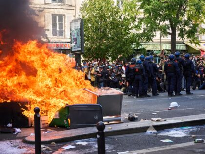 Police are present at a large student protest demonstration in Paris, France, on October 6