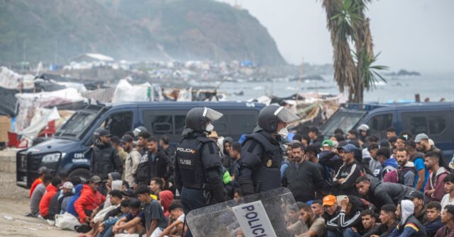 Spanish National Police Begin Operation to Clear Thousands of Illegal Migrants from Ceuta Beach Tent Camp